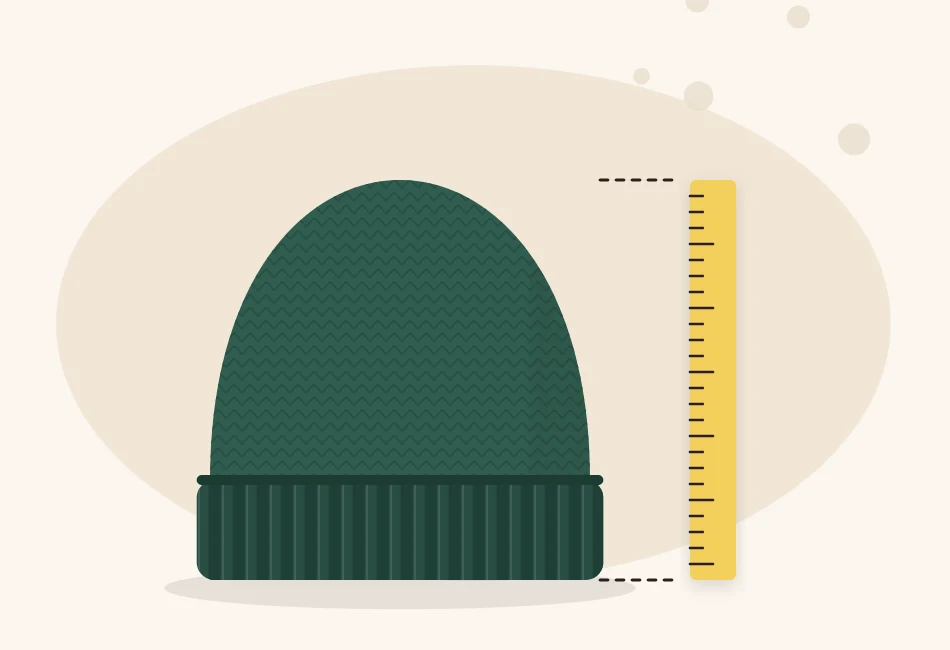 Illustration of a hat body on a circular needle with a ruler alongside it measuring the height from the cast-on edge