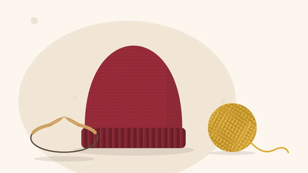 Illustration of a finished knitted beanie lying beside a ball of yarn and a circular knitting needle