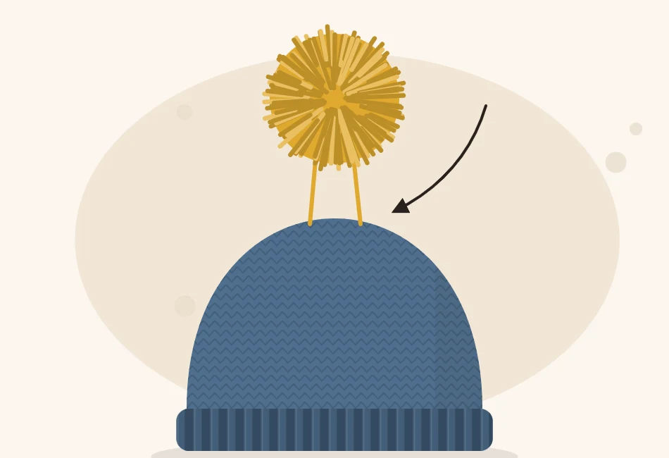 Illustration of a pom-pom being tied onto the top of a knitted hat, with its two tying strands passing down through the crown