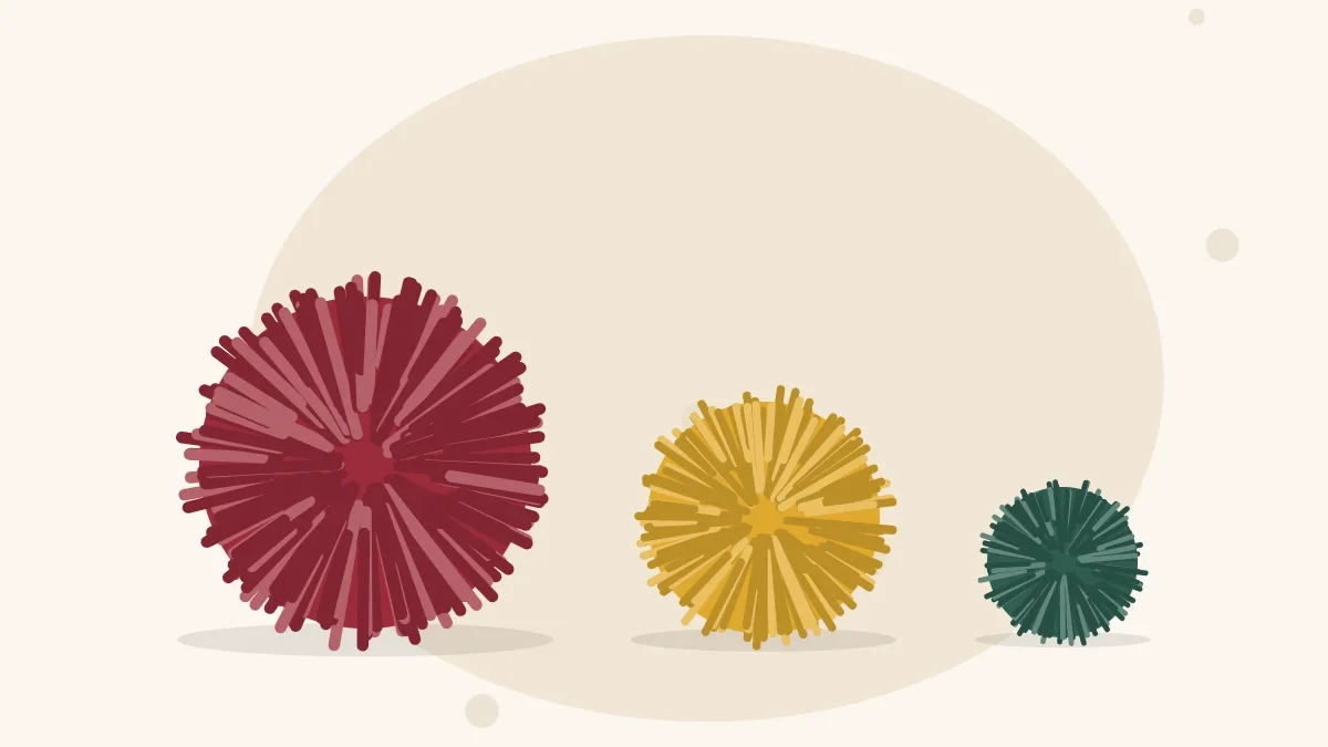 Illustration of three round yarn pom-poms in small, medium and large sizes